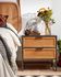 Kyoko bedside table made from solid fir wood with wicker and steel in black 50 x 51 cm