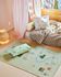 Llaru 100% cotton rug in green with multi-coloured trees 90 x 130 cm